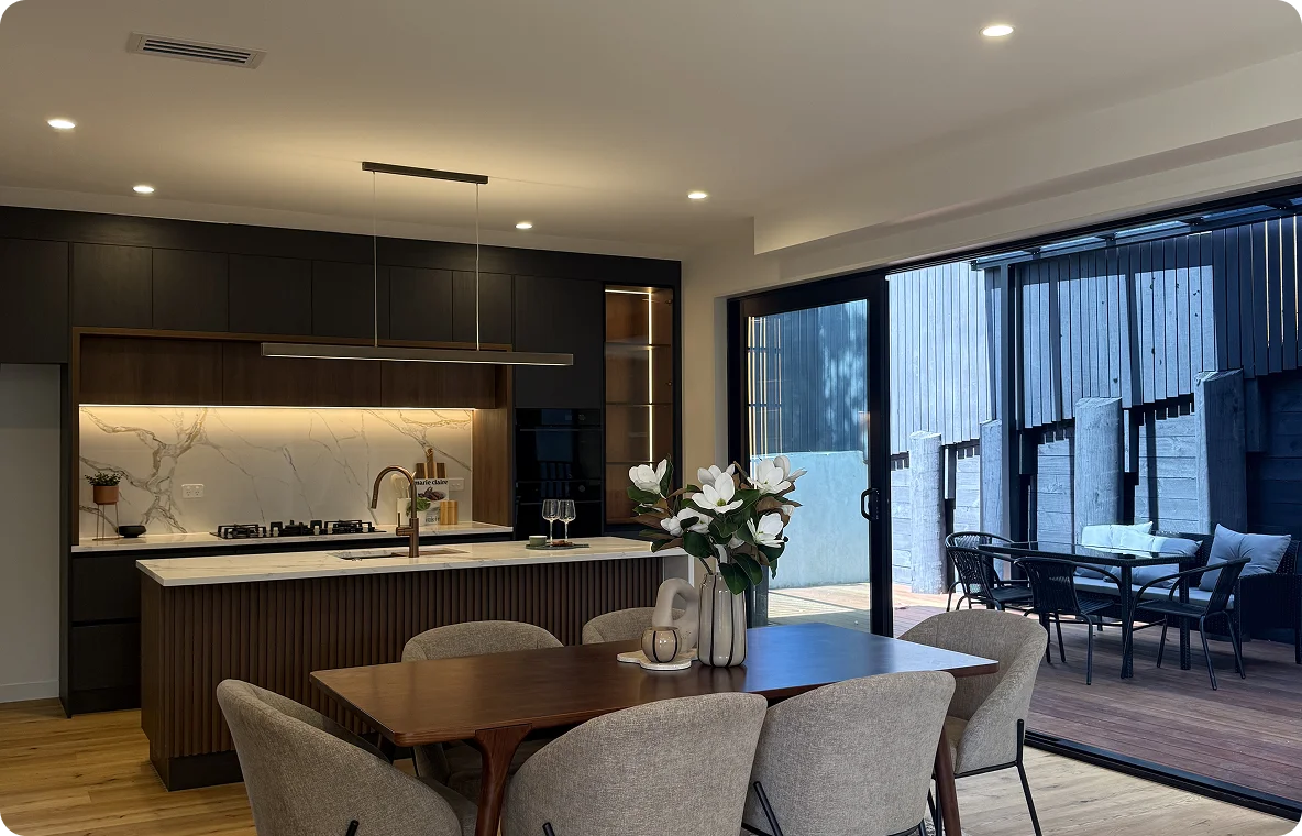 Modern kitchen and dining area showcasing elegant design, ideal for showcasing our Services.