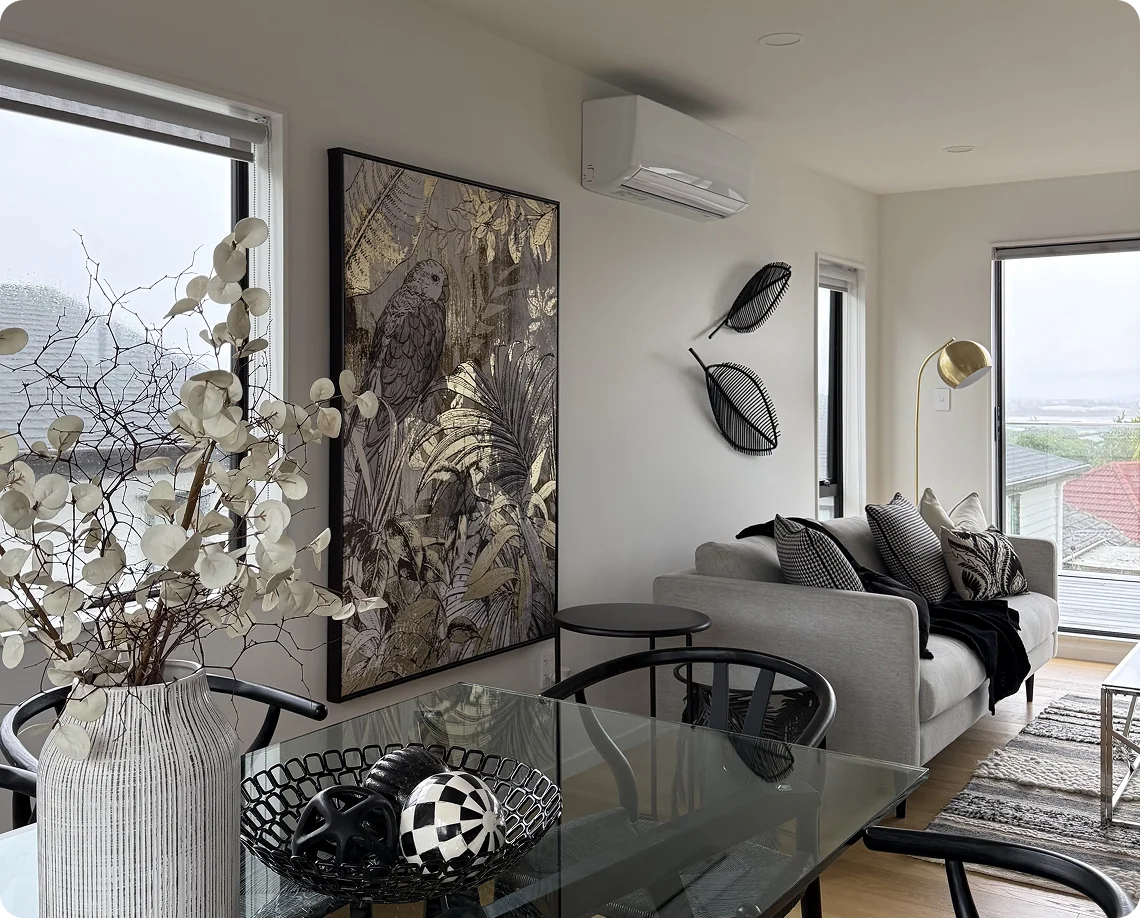 STAGY home staging Auckland: Modern living room with large artwork and grey sofa